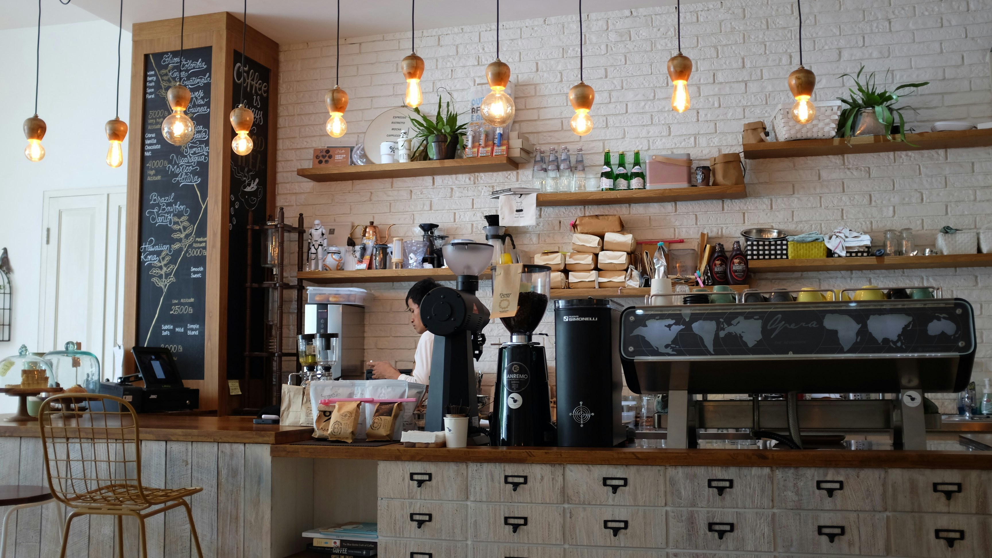 cozy café with an employee behind the counter