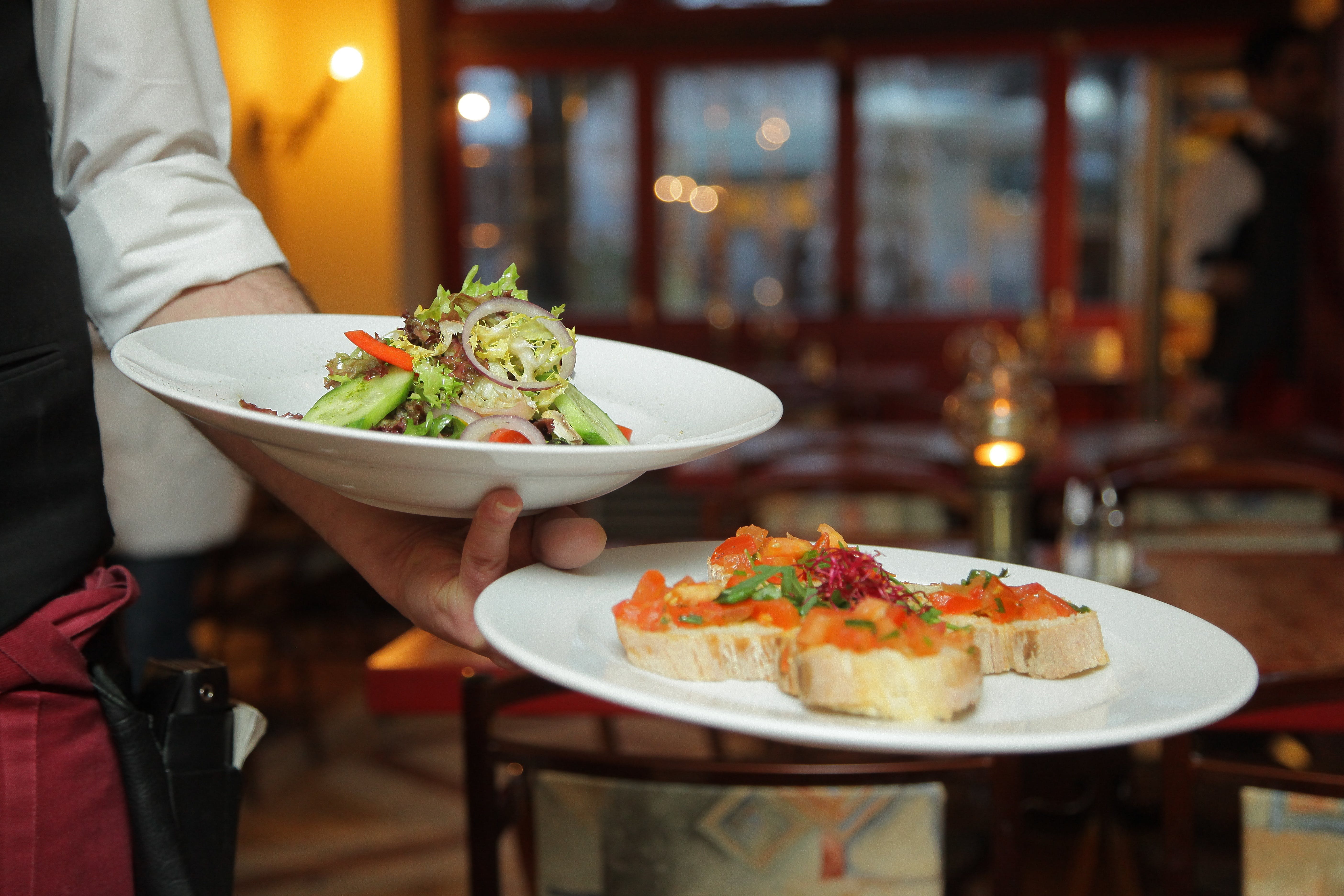 Two plates are served in a restaurant